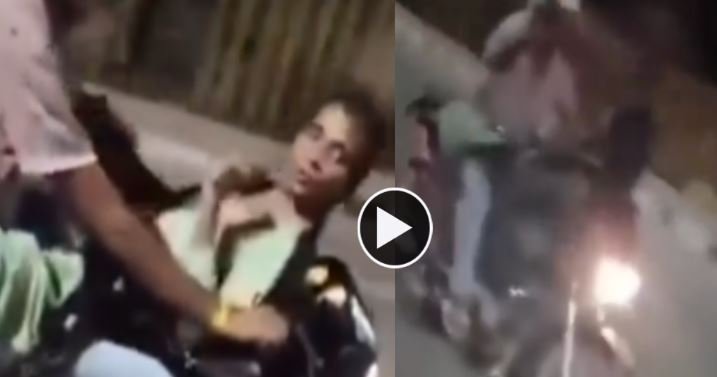 couple viral video on bike हाईवे पर रोमांस का स्टंट चलती बाइक पर कपल का वीडियो वायरल लोगों में गुस्सा